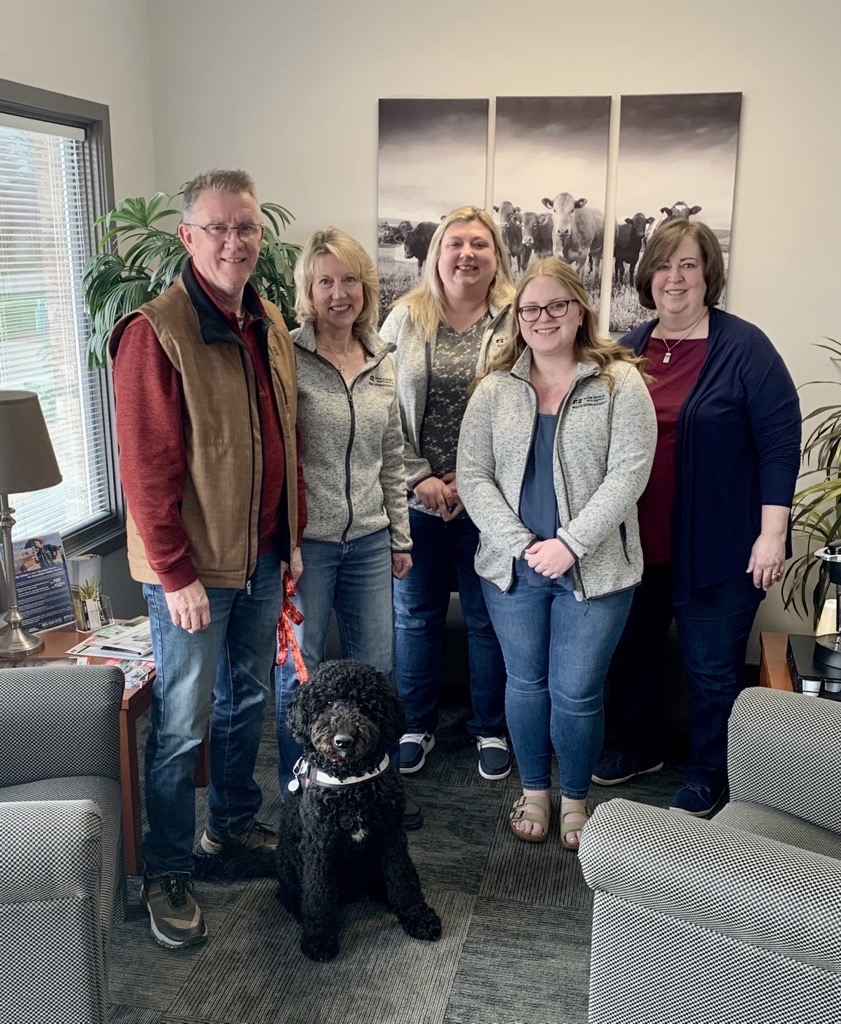 team photo with lewis the dog